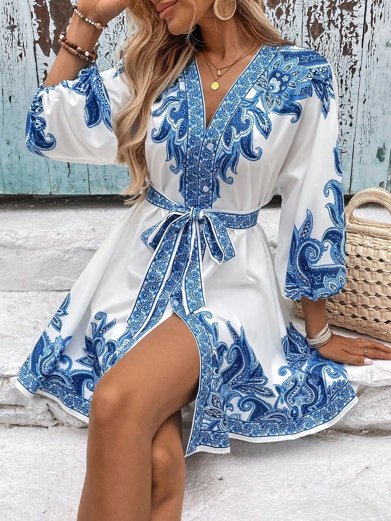 Printed V-neck three-quarter sleeve tie waist dress