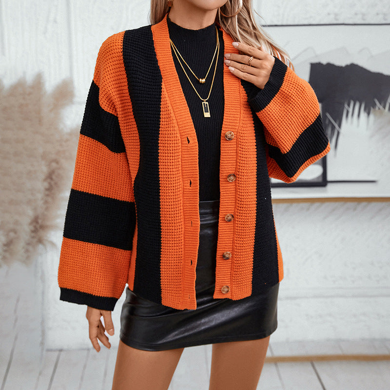 Knitted cardigan with contrasting stripes and wide trumpet sleeves