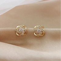 Lourdes - Gold Spiral Earrings with Crystals