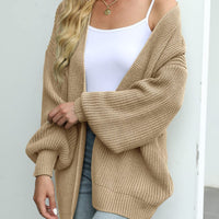 Knitted cardigan for women with long lantern sleeves